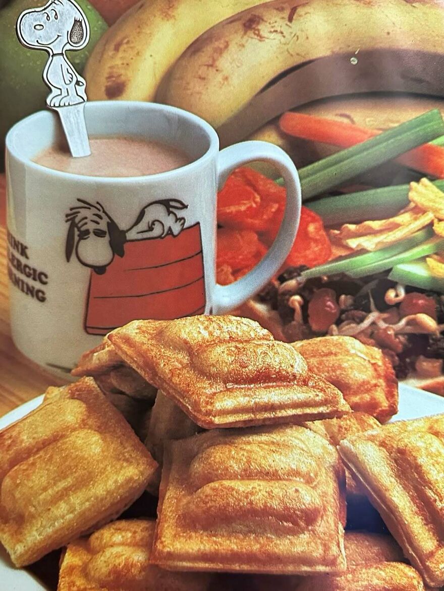 Vintage recipes featuring bizarre fried snacks served with a beverage in a Snoopy-themed mug and fresh vegetables.