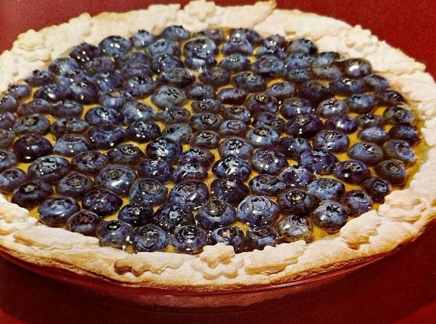 Close-up of a vintage blueberry pie showcasing an interesting vintage recipe from the bizarre dishes of the past.