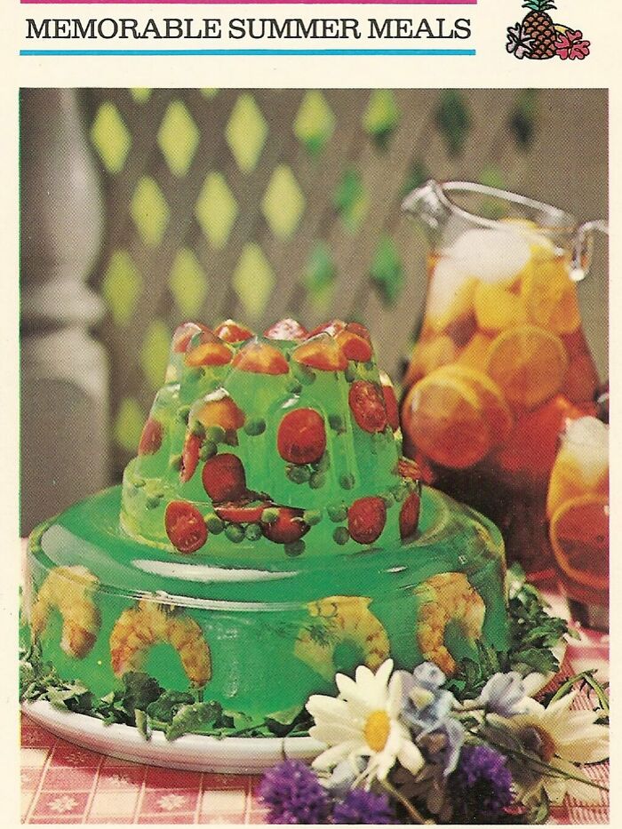 Vintage gelatin mold with shrimp and vegetables, a disturbingly creative retro recipe reflecting Gen X food trends.