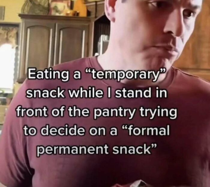Man in a kitchen standing by pantry eating a snack, humorous meme about choosing a permanent snack, laughgorithm meme.