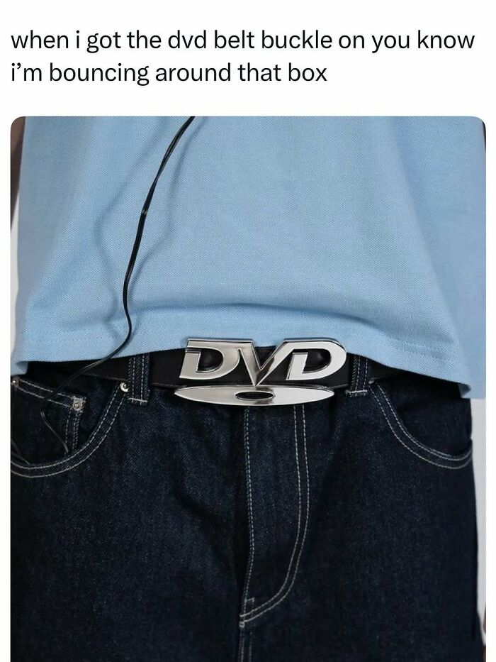 Person wearing a DVD belt buckle with jeans and a blue shirt, an entertaining post to help fight boredom and sadness.
