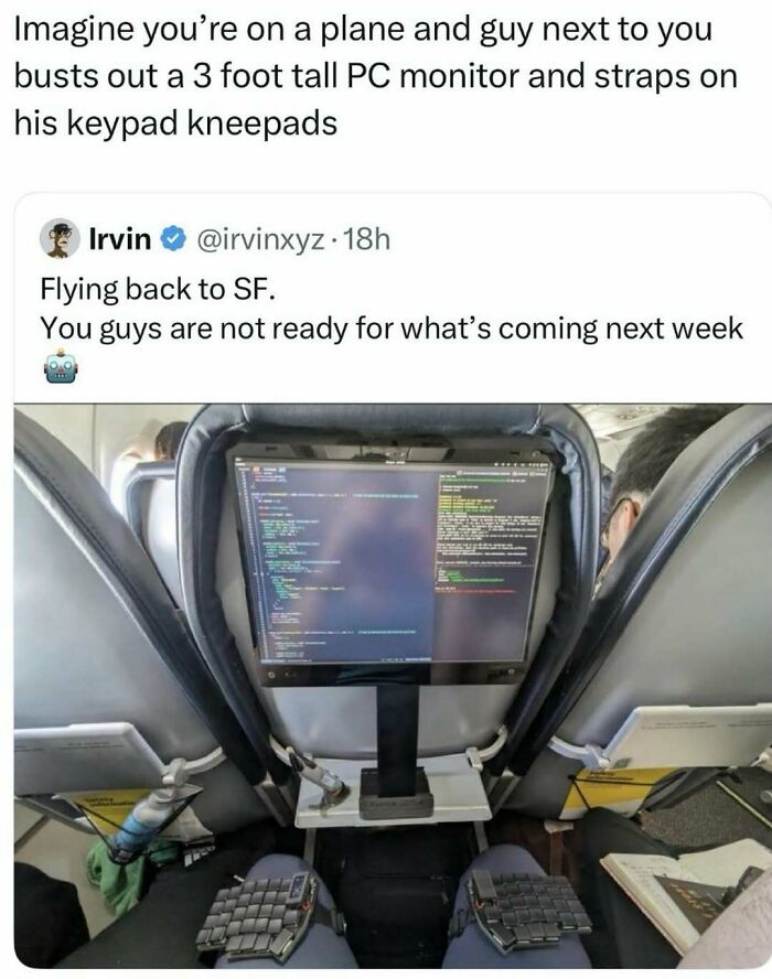 Man on a plane with a 3-foot PC monitor and keypad kneepads, a funny post to fight boredom and sadness.