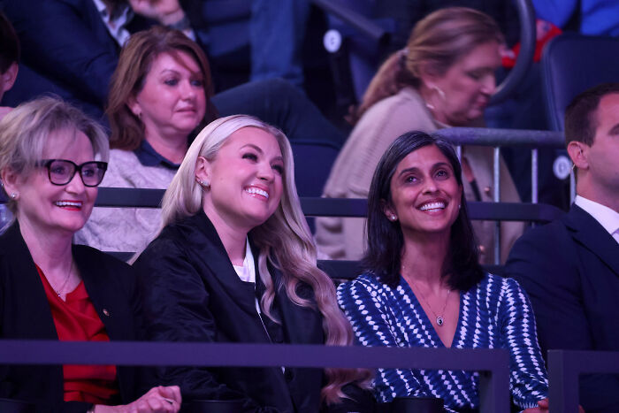 Erika Kirk smiling at TPUSA event during emotional exchange with JD Vance as revealed by lip reader.