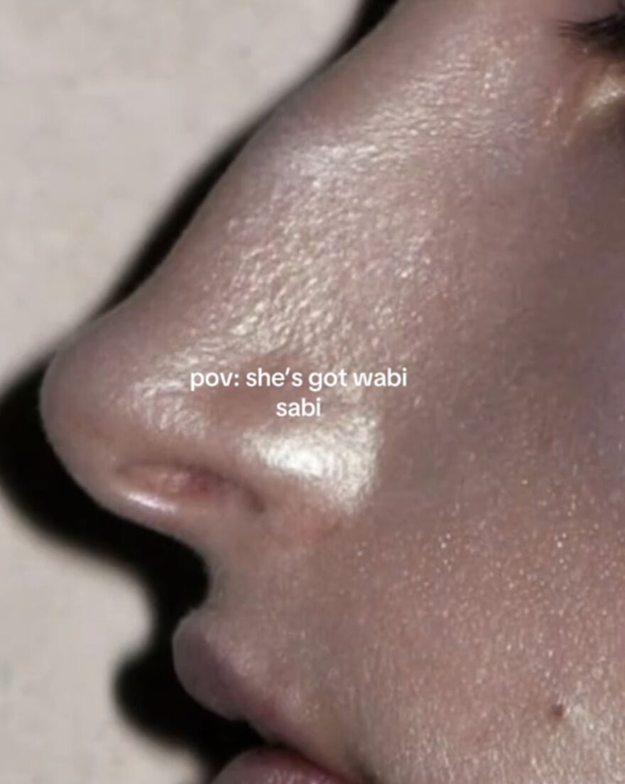 Close-up of a person's nose and skin texture showcasing perfect imperfections and natural beauty in a wholesome trend.