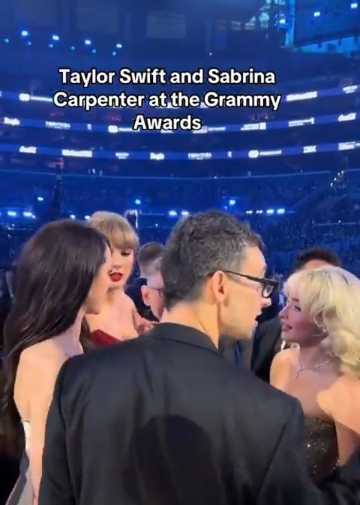 Taylor Swift and Sabrina Carpenter at the Grammy Awards in a video sparking debate about Taylor Swift manners.