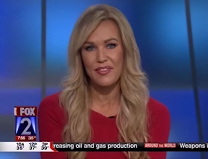 Former news anchor with long blonde hair wearing red, presenting on a Fox 2 news broadcast about a Halloween incident.