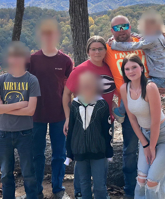 Family group photo outdoors with stepbrother of teen slain in cruise, highlighting disturbing details shared by ex.
