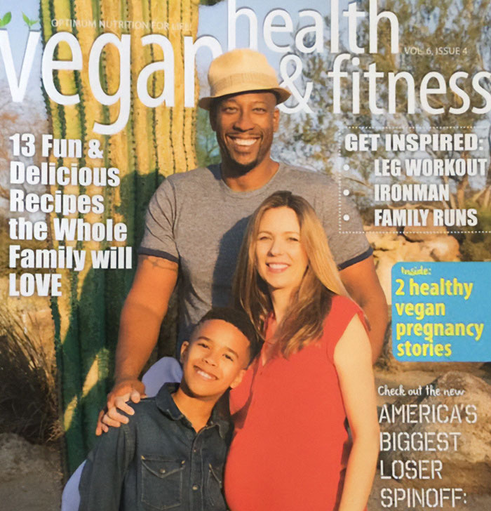 Family posing outdoors smiling, highlighting vegan health and fitness with recipes and workout inspiration.