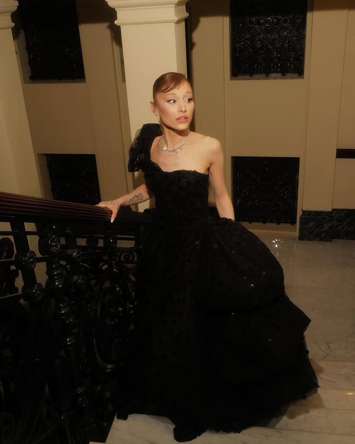 Ariana Grande in a black gown on stairs, fans concerned Wicked role is affecting her after recent appearance