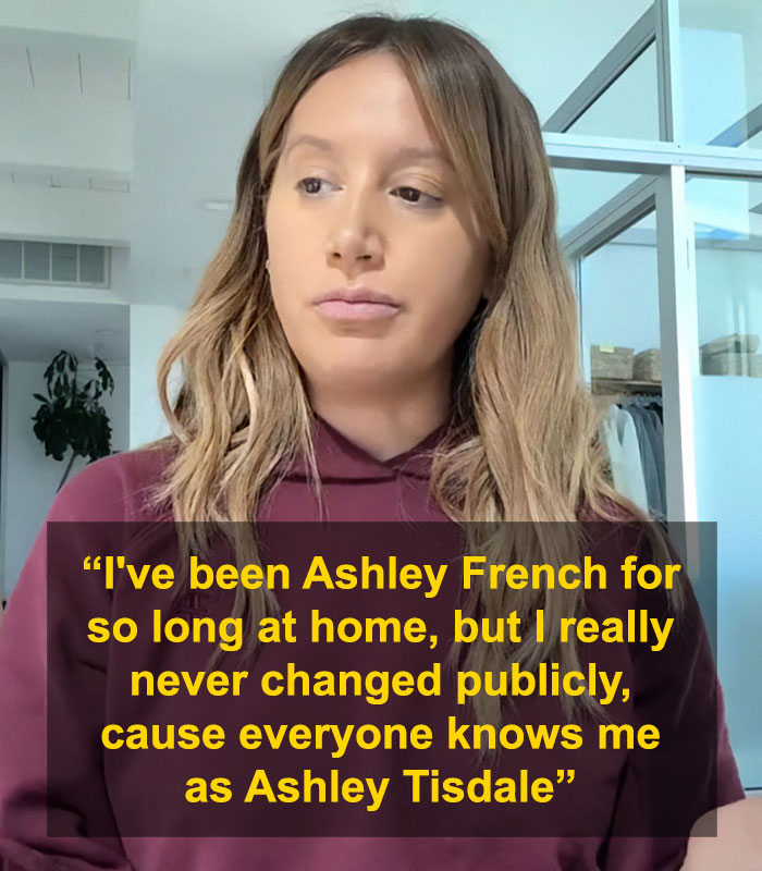 Ashley Tisdale discussing her official name change and reasons behind it in a casual indoor setting.
