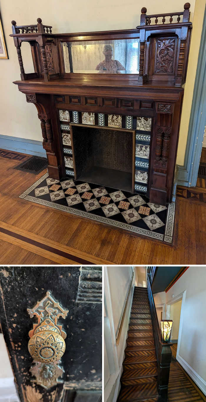 Ornate wood fireplace, intricate vintage door k**b, and detailed wooden staircase showcasing craftsmanship in an old house interior.