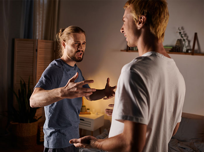 Two men in a heated argument indoors as bride&rsquo;s family considers calling off the wedding over legal threats.