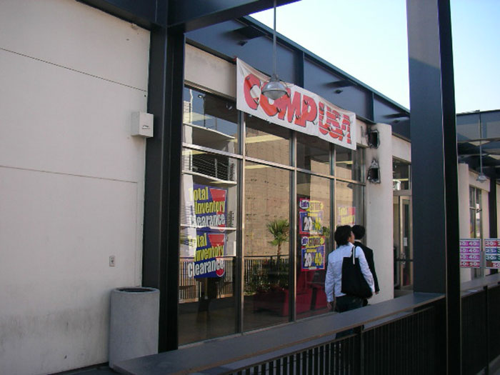 Empty storefront with clearance sale signs reflecting poor business decisions leading to lost clients.