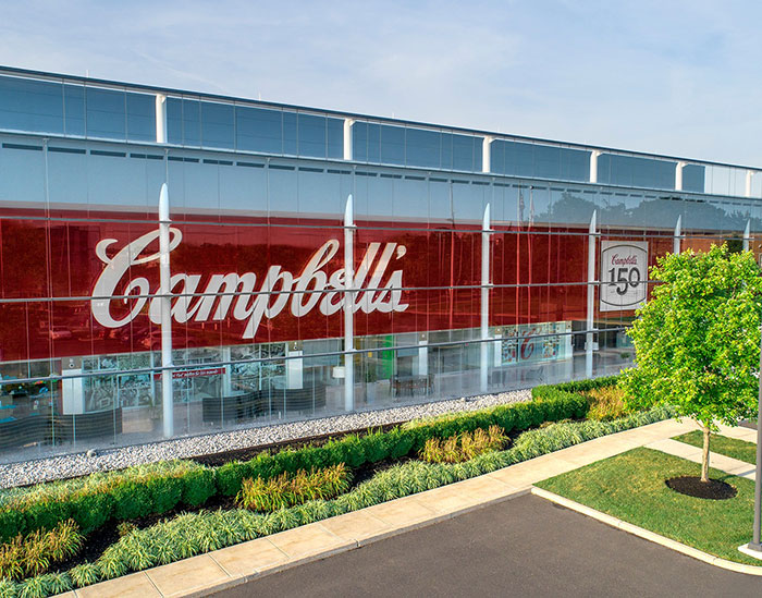 Campbell's building exterior with large logo, related to leaked audio exposing disturbing comments about soup ingredients.