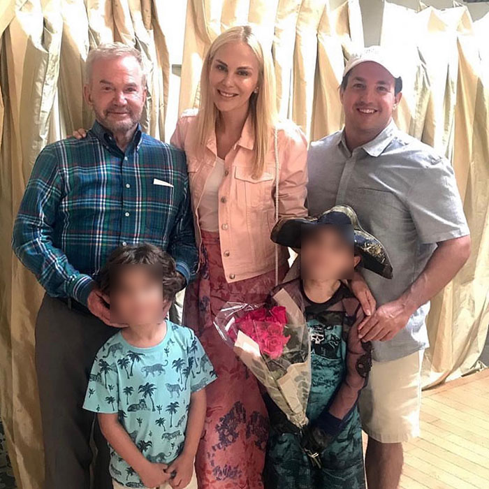Group photo of family including two children, a woman, and two men supporting a gravely ill veteran. Group photo of family including two children, a woman, and two men supporting a gravely ill veteran.