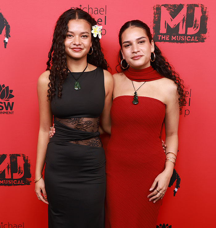 Two young women with long curly hair posing together at MD The Musical event, related to Disney Moana controversy