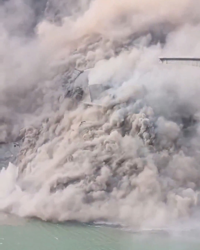 Horrific video showing China's ambitious bridge collapsing into a massive cloud of dust just months after opening over water. Horrific video showing China's ambitious bridge collapsing into a massive cloud of dust just months after opening over water.