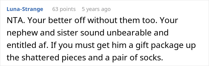 Screenshot of a Reddit comment discussing a woman who took back her nephew&rsquo;s Christmas gift due to family tensions.