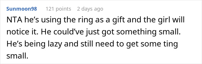 User comment about a man thinking his proposal counts as a Christmas gift, criticized for needing to get a proper gift.