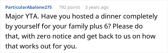 Screenshot of an online forum comment giving a reality check to a man who expects his wife to cook when inviting guests.