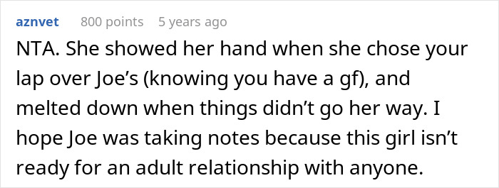 Comment discussing a guy irked that his friend wants to sit on his lap after crying, revealing she likes him.