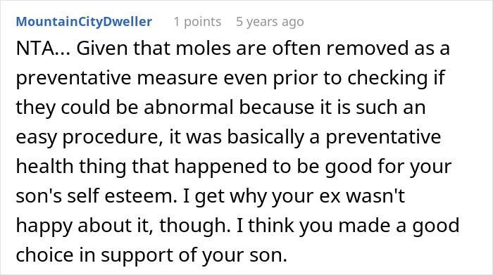 Reddit comment on dad approving son's mole removal, sparking mom's outrage over cosmetic surgery decision.