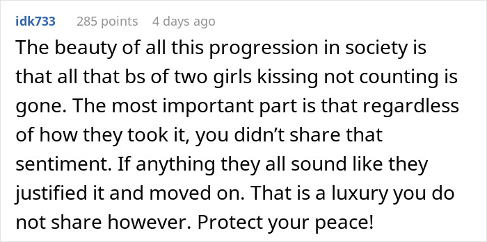 Comment discussing societal views on two women kissing and the impact on relationships and personal peace.