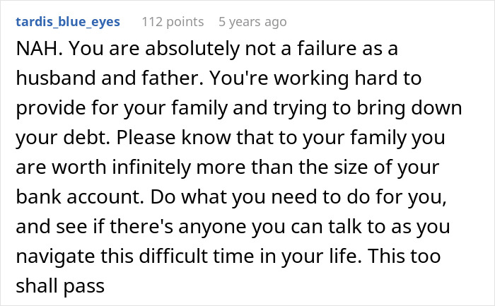 Reddit comment offering support to a father struggling with debt and considering canceling Christmas due to affordability.