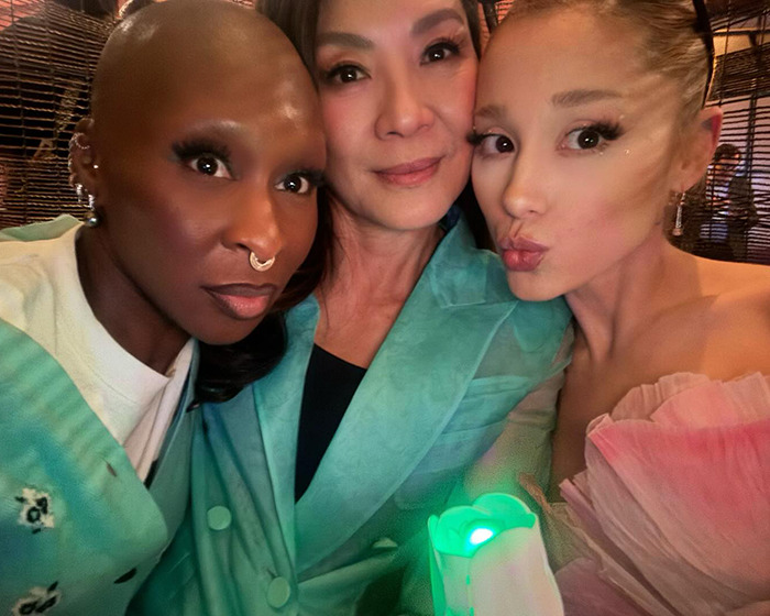 Ariana Grande with friends, close-up selfie highlighting concern over Ariana Grande's transformation and surgery rumors.