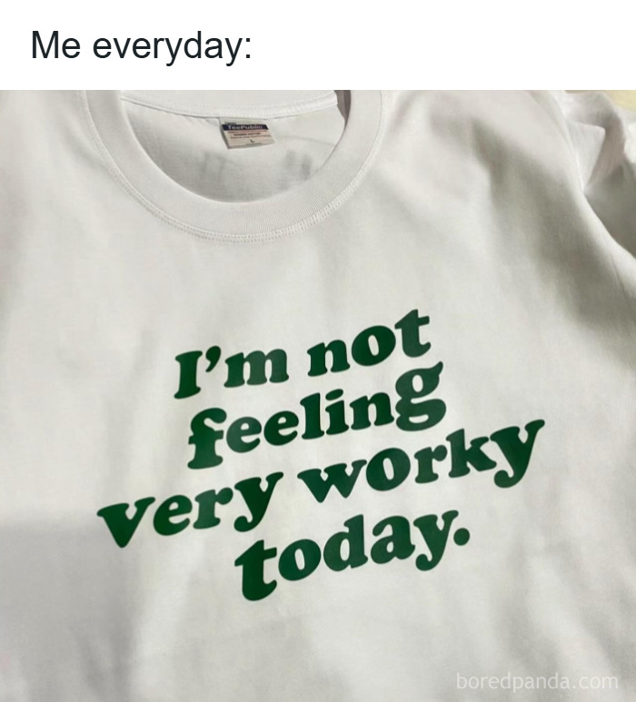 White t-shirt with green text humor meme expressing lack of motivation, related to random memes and unique experiences.