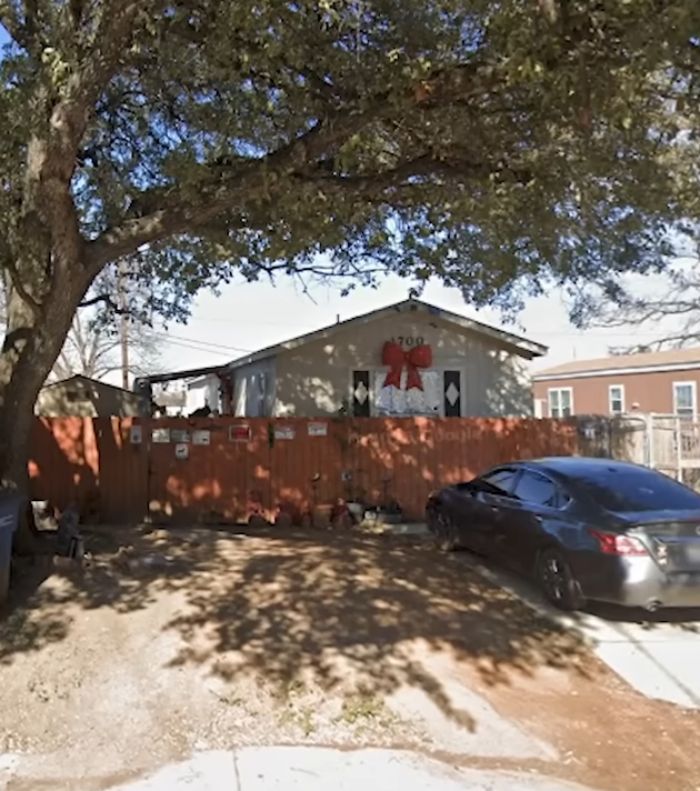 Suburban backyard and house where a woman was found chained for months in a bizarre case involving friends.