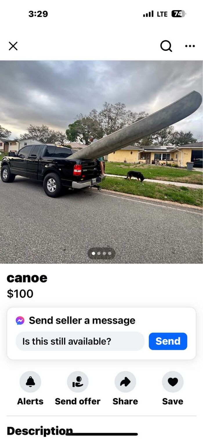 Black pickup truck carrying a long canoe sticking out of the back on FB Marketplace with unhinged posts vibe.