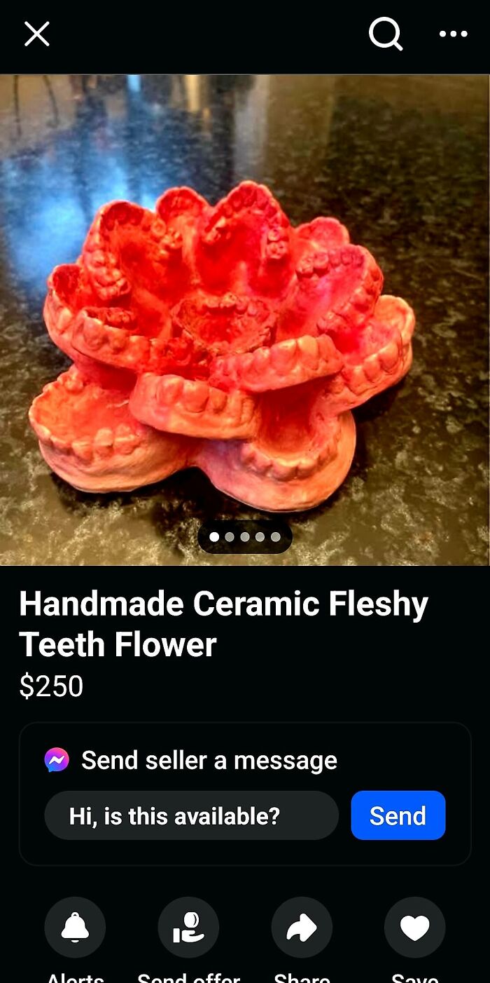 Handmade ceramic flower sculpture with fleshy teeth design, listed on FB Marketplace with unhinged posts appeal.