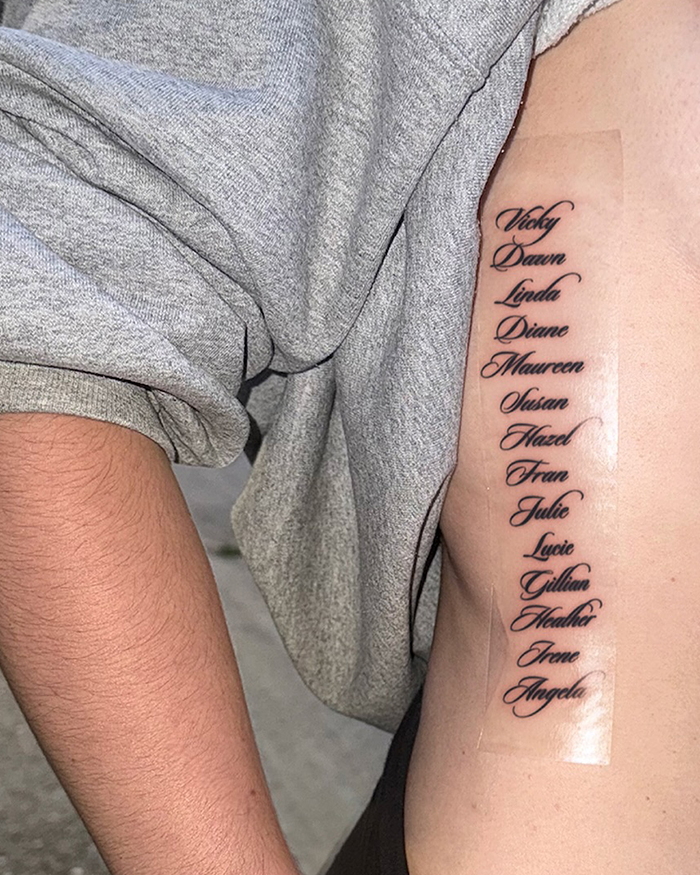 Tattoo of multiple women's names on a person's side sparking debate on feminist tattoo rule and dividing the internet.