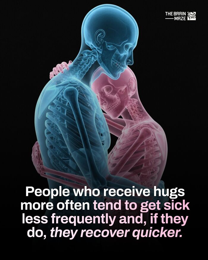 X-ray style illustration of two hugging human skeletons showing incredible facts about the human body health benefits of hugs.