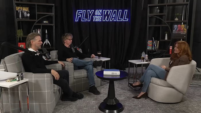 Isla Fisher discussing emotional struggle and difficult divorce with Sacha Baron Cohen during a Fly on the Wall podcast session.