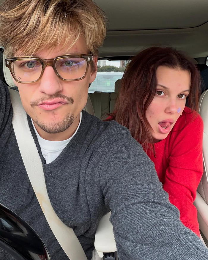 Jake Bongiovi and Millie Bobby Brown in a car, capturing a candid moment related to their baby protection incident.