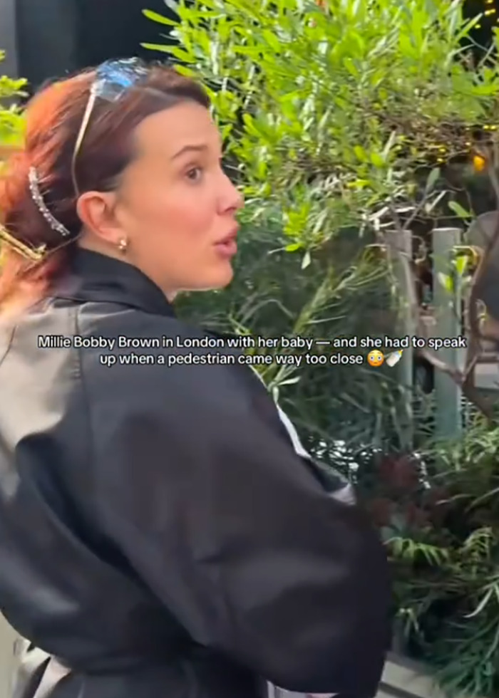 Millie Bobby Brown protecting her baby from a pedestrian while Jake Bongiovi is called out for not helping.