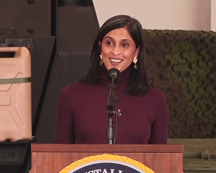 Usha Vance speaking at a podium addressing marriage split rumors after a ringless photo sparked an online meltdown. Usha Vance speaking at a podium addressing marriage split rumors after a ringless photo sparked an online meltdown.