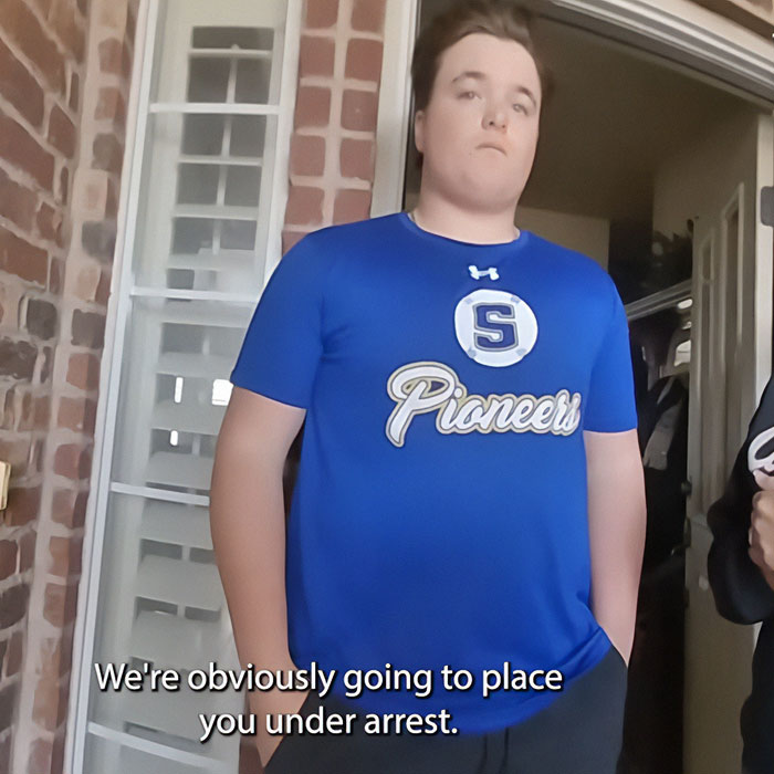 Teen in blue Pioneers shirt stands indoors with caption about arrest amid protests erupting across Oklahoma.