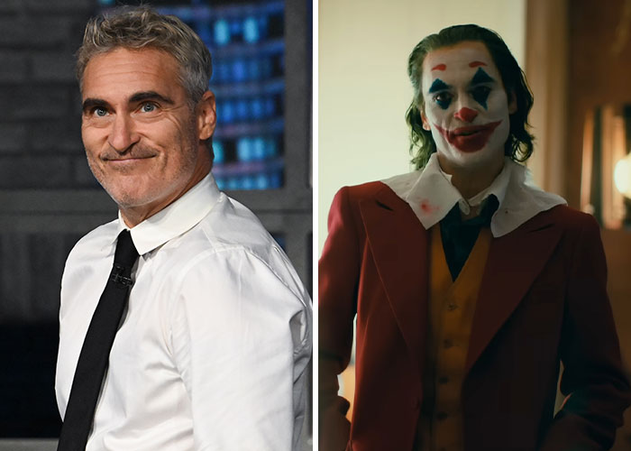 Actor Joaquin Phoenix smiling in a white shirt and tie beside him as Joker character in full makeup and costume for a movie role.