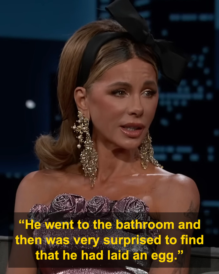 Kate Beckinsale in an interview wearing a purple dress and large earrings discussing unusual claims about her daughter's boyfriend. Kate Beckinsale in an interview wearing a purple dress and large earrings discussing unusual claims about her daughter's boyfriend.