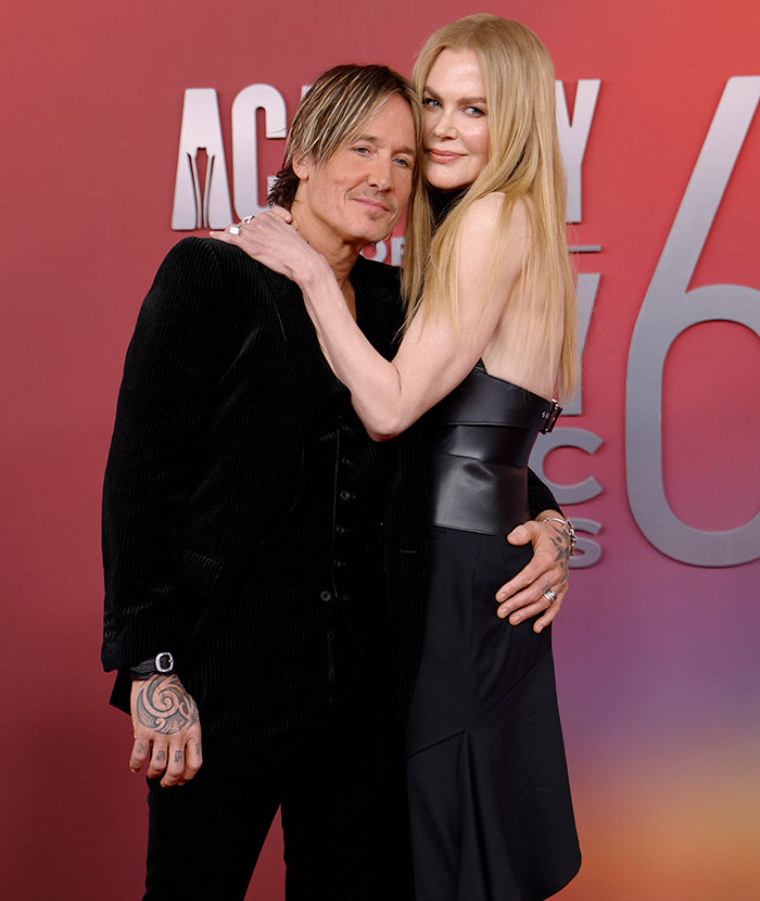 Nicole Kidman and Keith Urban posing together at a red carpet event, related to divorce criticism update. Nicole Kidman and Keith Urban posing together at a red carpet event, related to divorce criticism update.