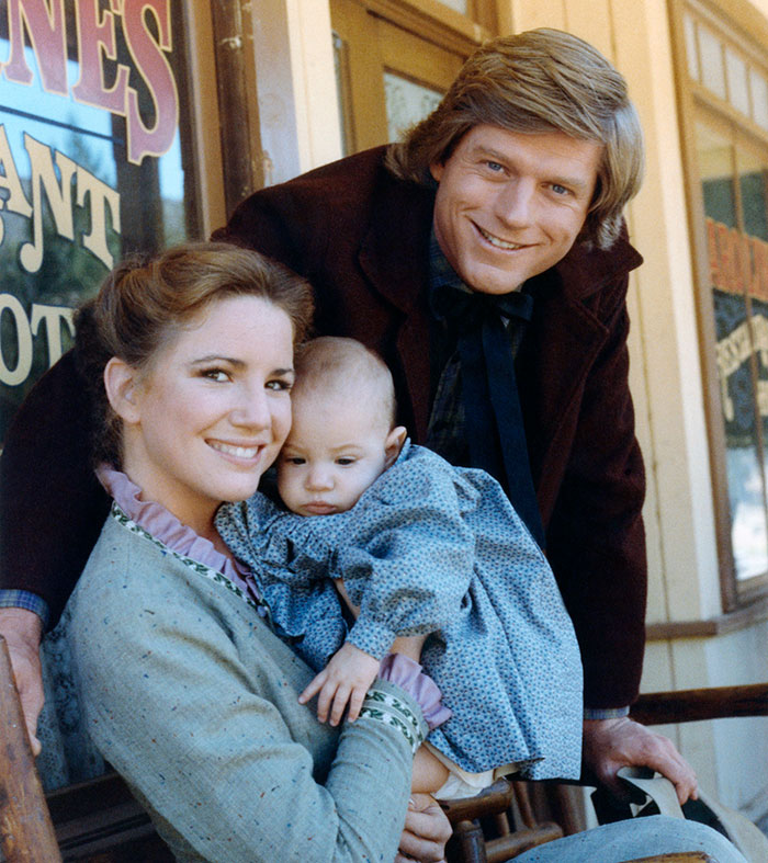 Melissa Gilbert with her on-screen husband and baby, reflecting on the age gap during her role at 15 years old.