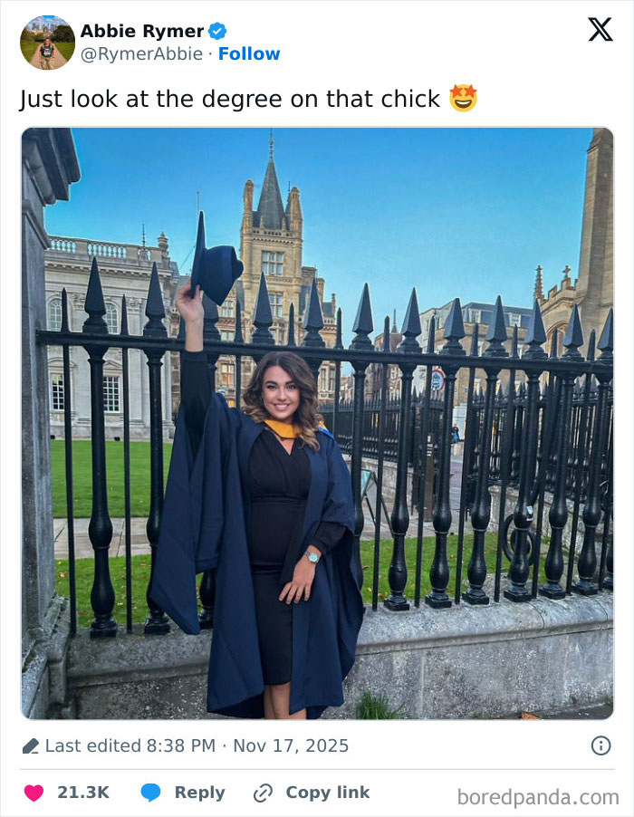 Young woman in graduation gown celebrating her PhD accomplishment outdoors with historic university buildings in the background Young woman in graduation gown celebrating her PhD accomplishment outdoors with historic university buildings in the background