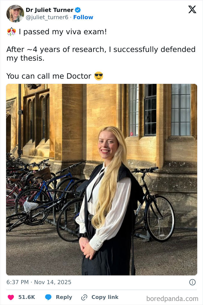 Young woman celebrates passing PhD viva exam, standing outside historic building with bicycles in background. Young woman celebrates passing PhD viva exam, standing outside historic building with bicycles in background.