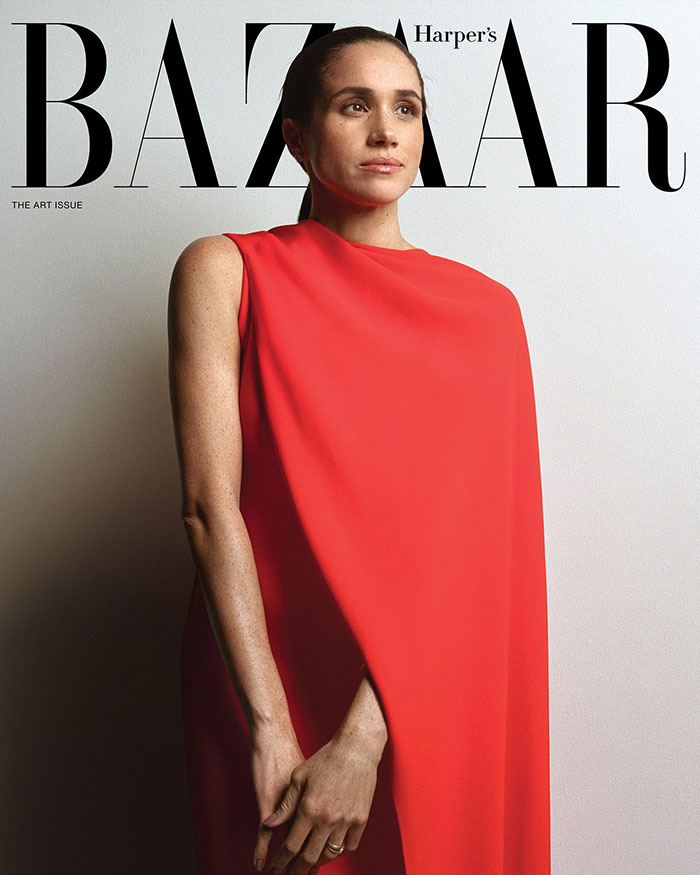 Meghan Markle in a red dress posing for Harper's Bazaar cover, linked to recreating Princess Diana photo controversy. Meghan Markle in a red dress posing for Harper's Bazaar cover, linked to recreating Princess Diana photo controversy.