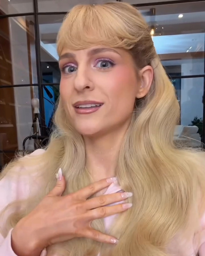 Meghan Trainor speaking confidently in a bright room, addressing stretch marks on your skin and personal transformation.