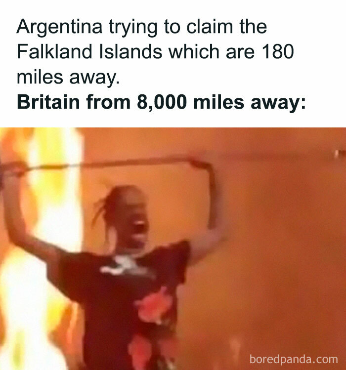 Person shouting wildly with raised arms near fire, capturing hilarious history memes about territorial claims and conflicts.