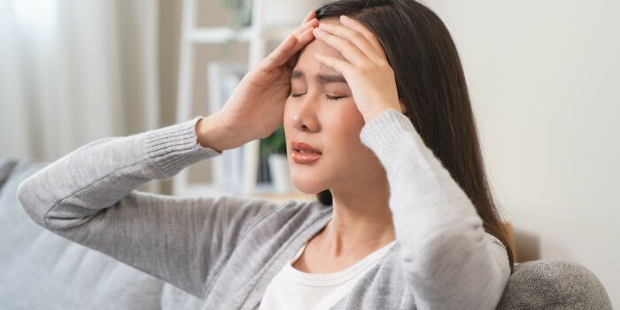 Woman stressed at home, frustrated by father-in-law treating daughter-in-law unfairly, husband upset over her ban decisions.